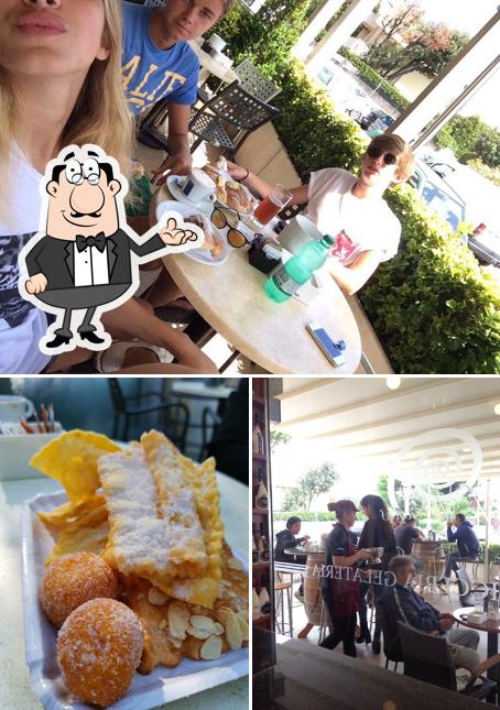 Dai un'occhiata agli interni di Cafè Des Amis