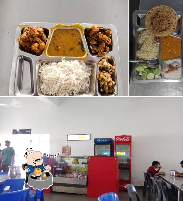 Take a look at the photo showing food and interior at Malviya Mess