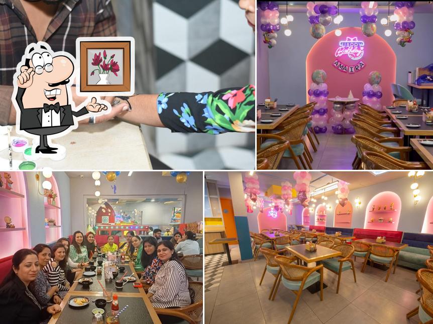 Take a seat at one of the tables at Cartoony Planet