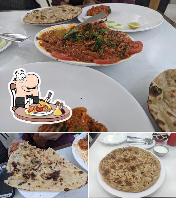 Get pizza at Cream House