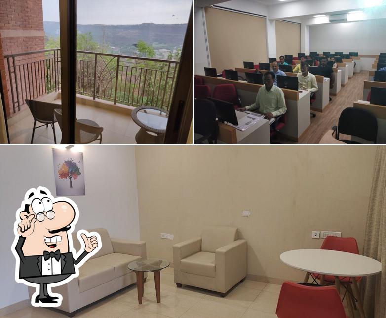 Take a seat at one of the tables at Sandipani Hometel