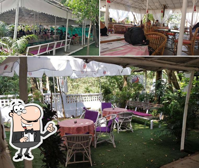 Take a seat at one of the tables at Lila Cafe