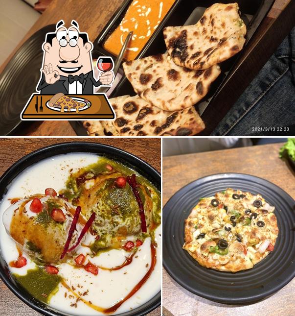 Get pizza at Prashadam Sweets