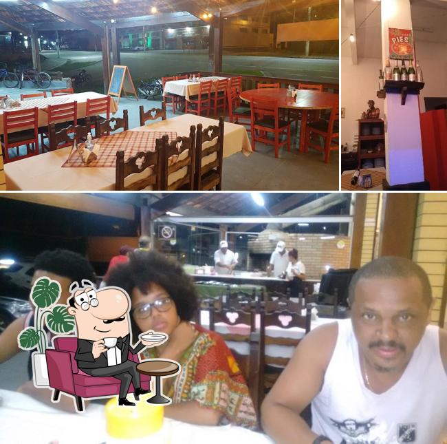 A ilustração da interior e cerveja no Pizzaria e Restaurante Firenze