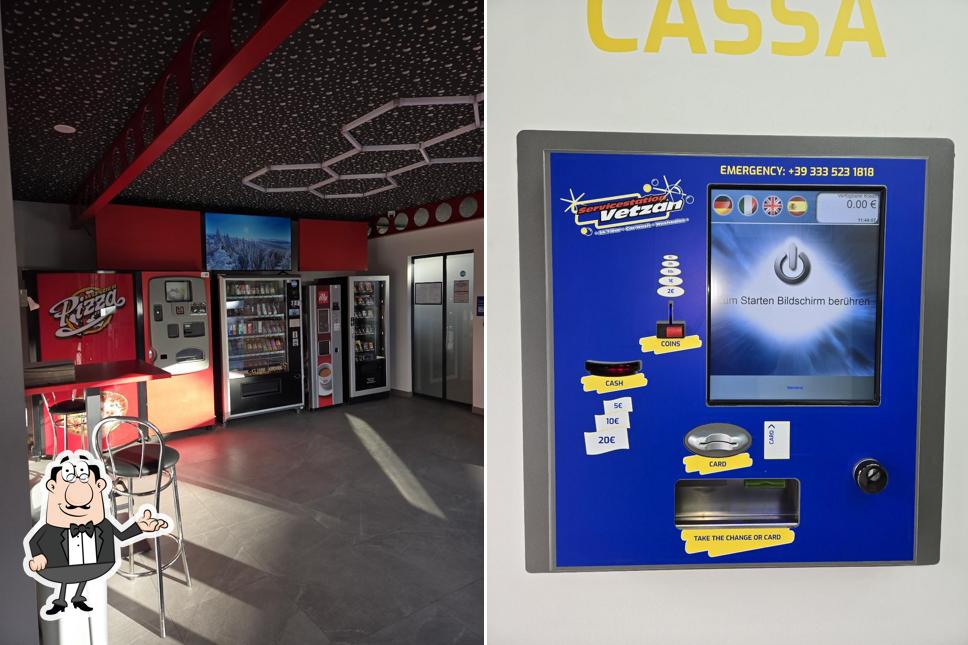 Gli interni di 24/7 Bar mit Pizzaautomat+Washsalon