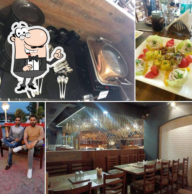 Take a seat at one of the tables at The Barbeque Paradise
