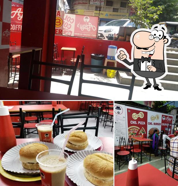 Take a seat at one of the tables at Ajay's Nanpura Surat