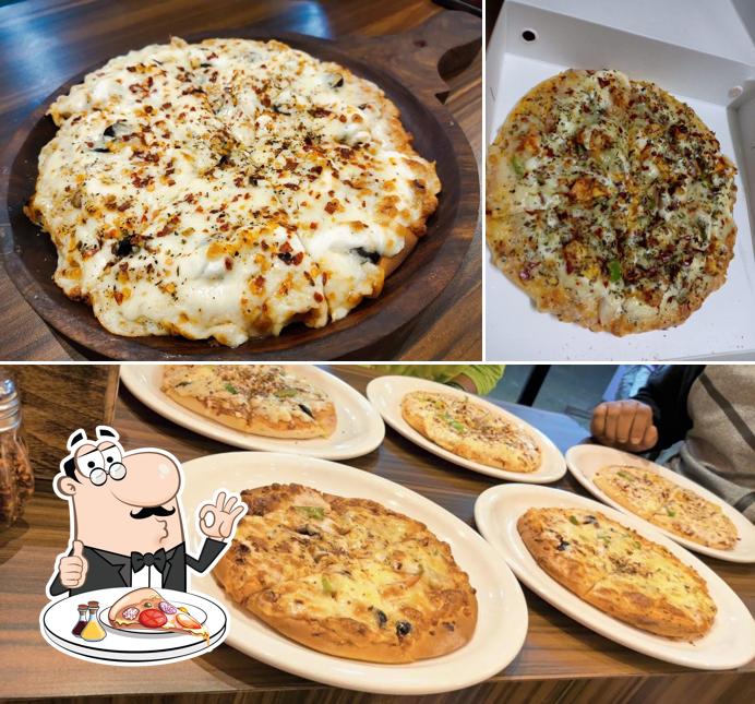 Try out pizza at 7th Heaven - Kankavli’s Best cafe