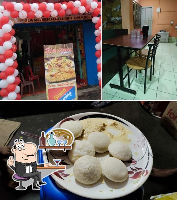 Take a look at the picture depicting interior and food at South Corner