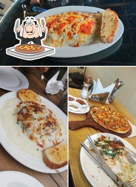 Try out pizza at The Bean Journal Boutique Café