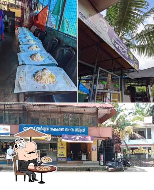 Among different things one can find exterior and food at Janakeeya hotel
