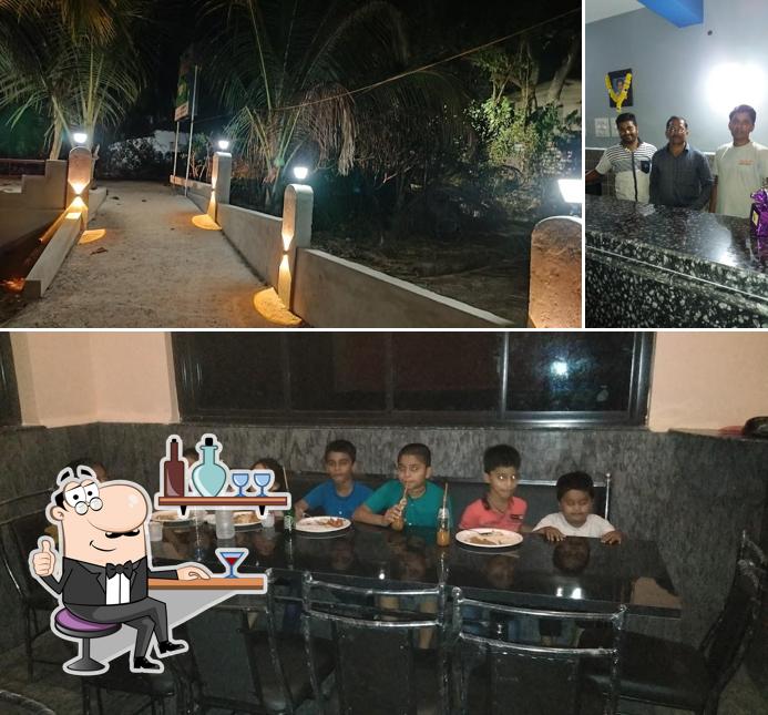 The photo of interior and dining table at Javin Snacks