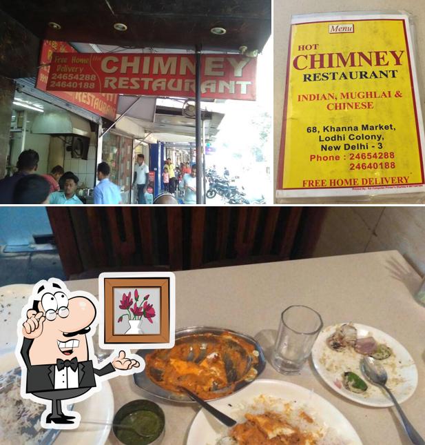 Take a seat at one of the tables at Hot Chimney Restaurant