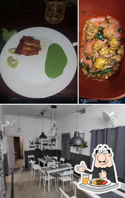 Check out the picture displaying food and dining table at Spicy hut restaurant