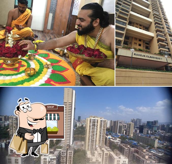 This is the image displaying exterior and cake at Raheja Classique Bldg No 4