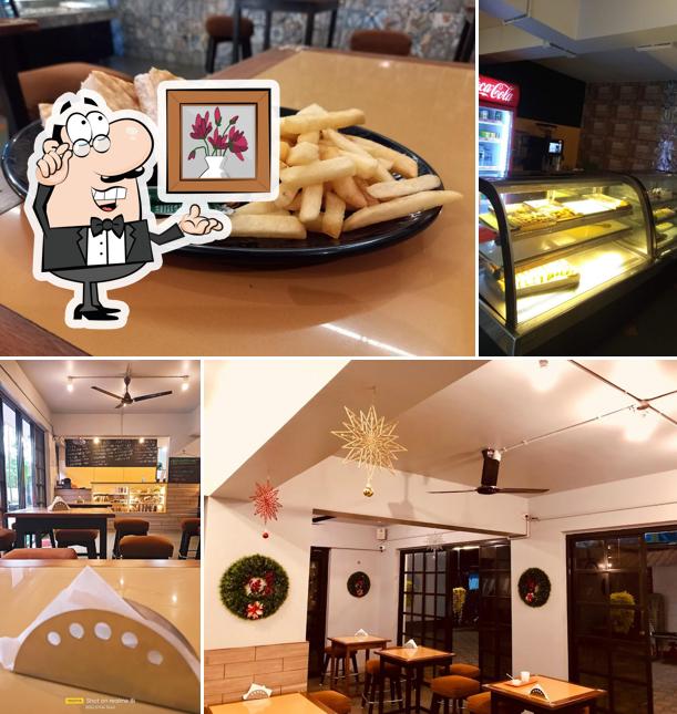 Take a seat at one of the tables at Crumbs Bakery