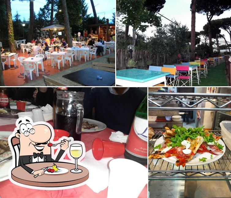 Tra le varie cose da La Pineta Pizzeria si possono trovare la cibo e interni