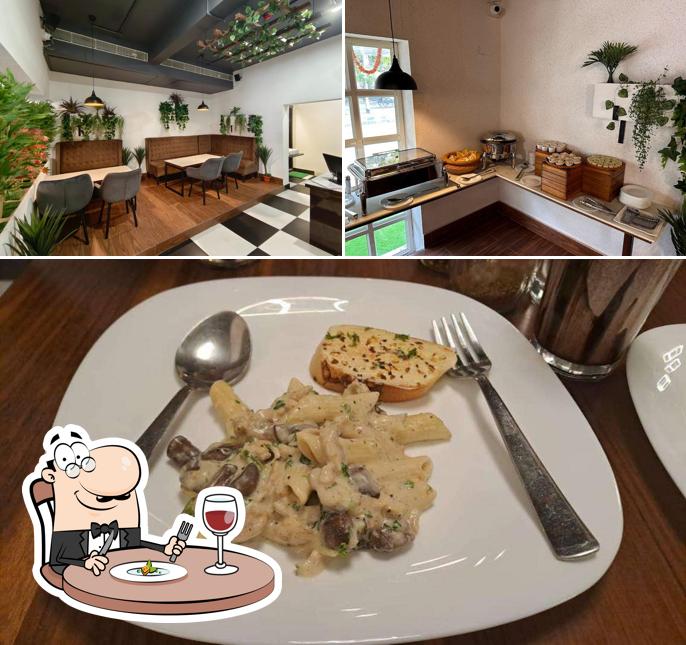 Check out the image depicting food and interior at Pepper Town