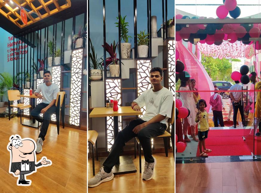 Take a seat at one of the tables at One9 Cuisine