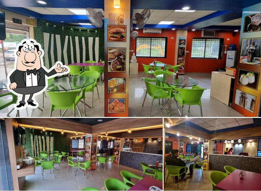 The interior of The Royal's Cafe & Restaurant Best Restaurant In Rajpipla Best Family Restaurant Fast Food Restaurant Best Cafe