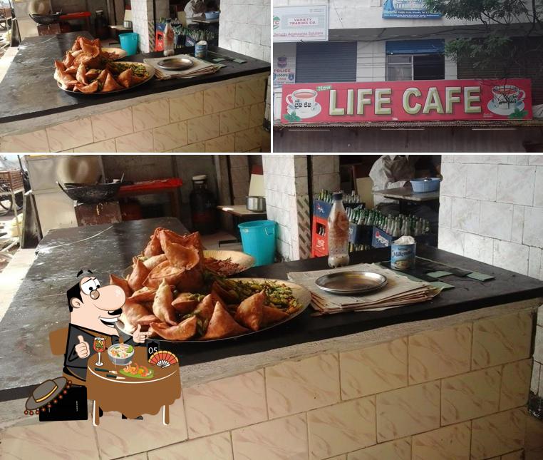 This is the image displaying food and exterior at THE ROXY CAFE