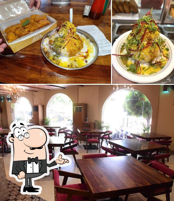 The photo of interior and beverage at Govindam Sweets