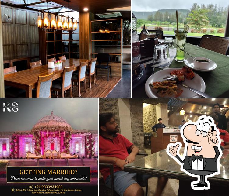 Take a seat at one of the tables at Kharghar Golf Course Pavithra Cafe