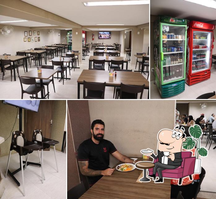 Sente em uma das mesas no Cantinho Brasileiro - Restaurante Asa Norte