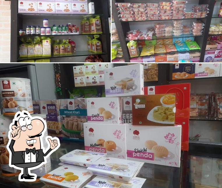 Take a seat at one of the tables at Atul Bakery Kosamba Surat