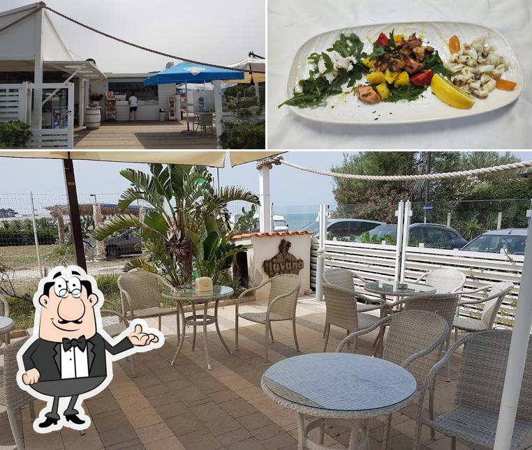 Questa è la foto che presenta la interni e cibo di L'Attracco -Capojale