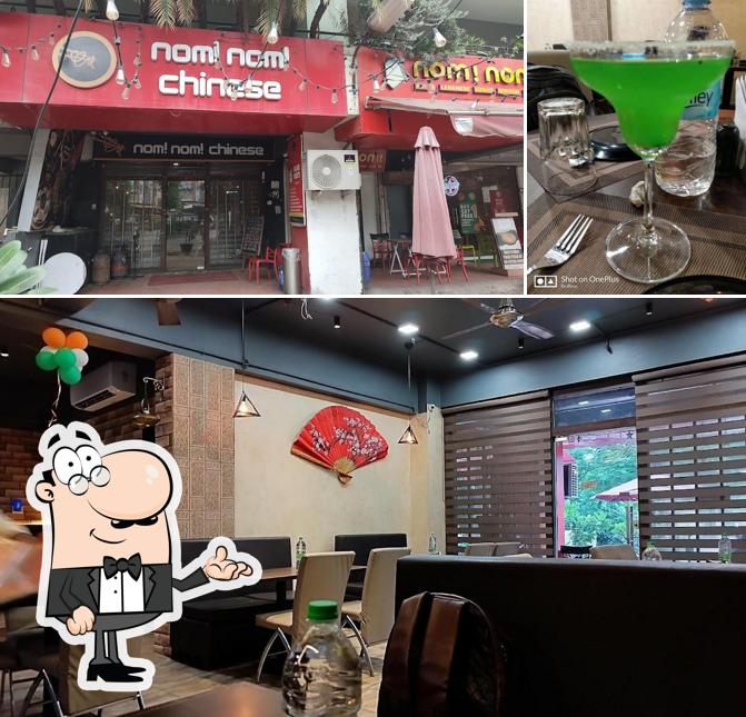 The picture of interior and beverage at Nom!Nom! Chinese