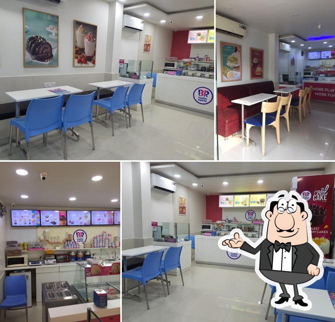 Take a seat at one of the tables at Baskin Robbins