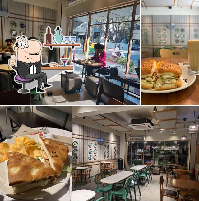 Take a seat at one of the tables at Third Wave Coffee