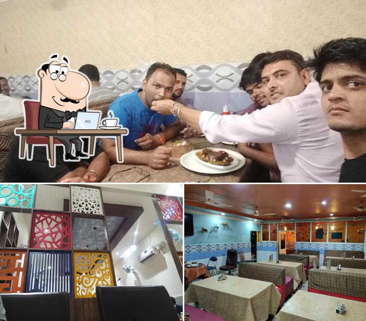 Take a seat at one of the tables at Madhu Milan Family Dhaba