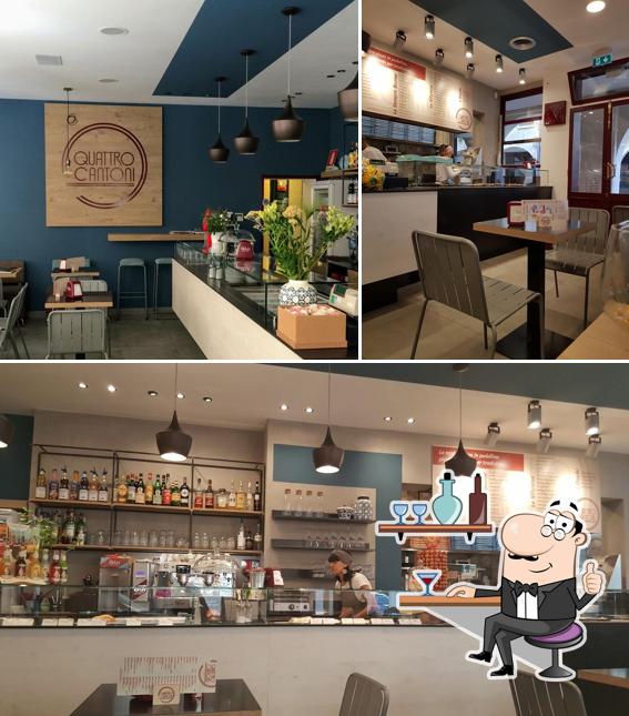 Siediti a un tavolo di Pizzeria ai Quattro Cantoni