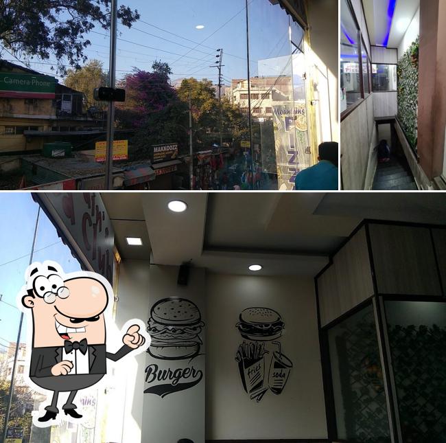 Check out the image showing exterior and interior at Mountain'S PIZZA club, Solan