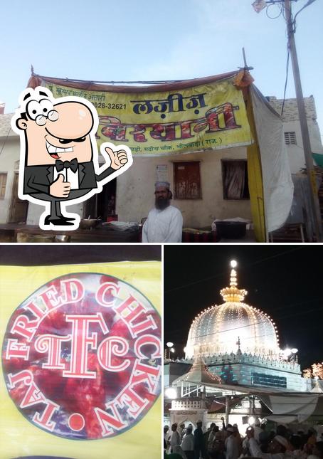 Look at the picture of Taj Fried Chicken Lazeez Biryani