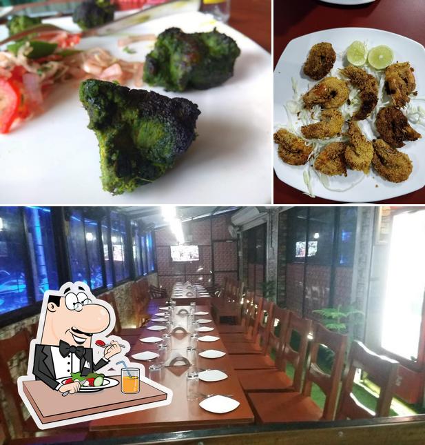 The image of White House nature Inn family restaurant n bar poriem’s food and interior