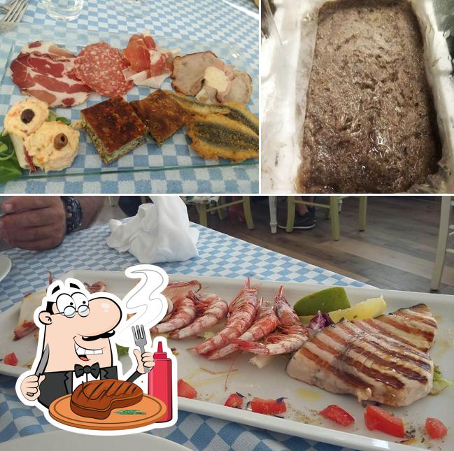 Ordina i un pasto a base di carne a Osteria Amori e Sapori