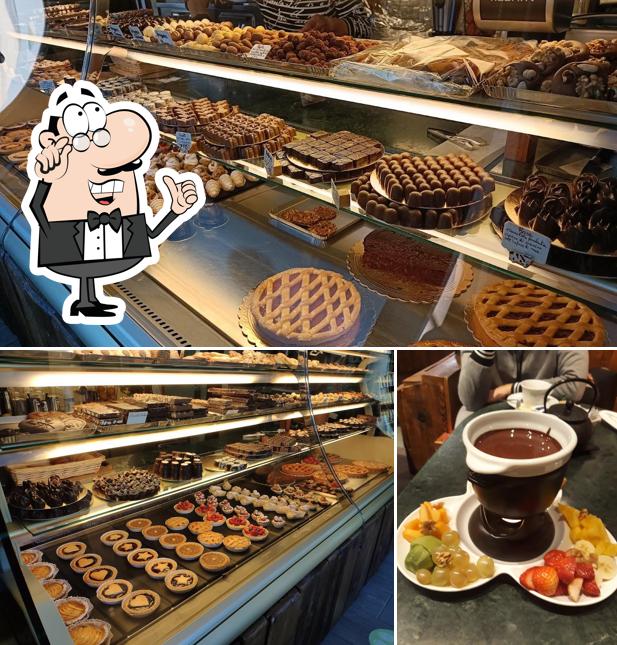 Dai un'occhiata agli interni di Chocolat Collomb - La miglior CIOCCOLATERIA, pasticceria, gelateria, cioccolatini artigianali e aperitivi in Val d'Aosta