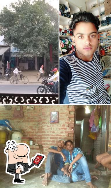 Look at the picture of AZAD BATTERY SARVIEC & SAIBAR CAFE