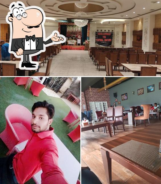 Take a seat at one of the tables at Chawla Chicken