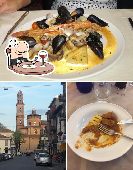 Dai un’occhiata alla foto che presenta la cibo e esterno di Pizzeria Ristorante Albergo Ugolini