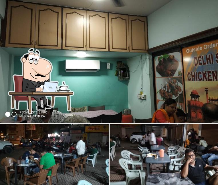 Take a seat at one of the tables at Delhi State Chicken Center