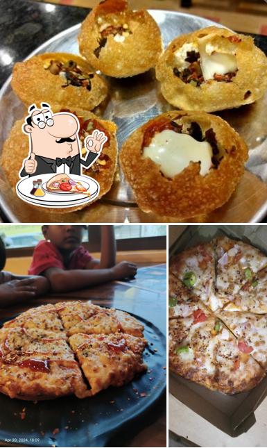 Pick pizza at EATERIES CAFE RELIANCE TREND KUNDA