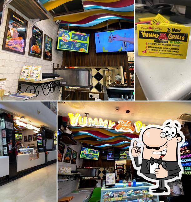 Look at this image of Yummy Grills