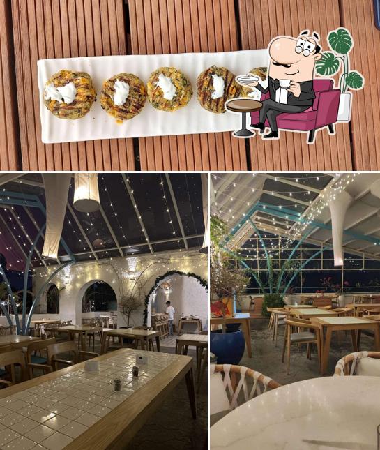 This is the picture displaying interior and food at Cafe Azzure : Airport Road