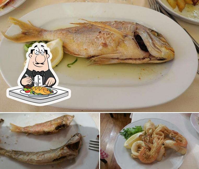 Ristorante Il Picchio Rosso serve un menu per gli amanti dei piatti di mare