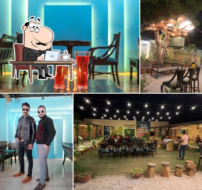 Take a seat at one of the tables at The Lush Restro & Cafe - Best Cafe & Multi Cuisine Restro In Balotra