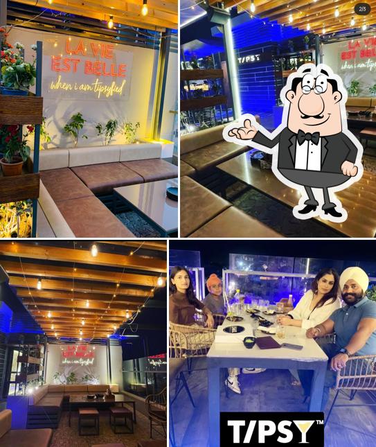 The interior of Tipsy Rooftop cafe and lounge